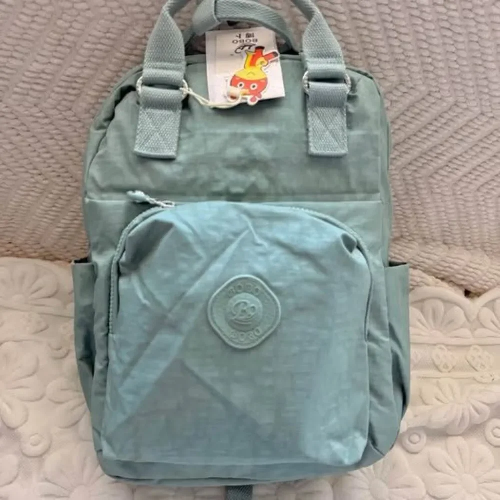 Water-Resistant Nylon Multi-Compartment Backpack – New